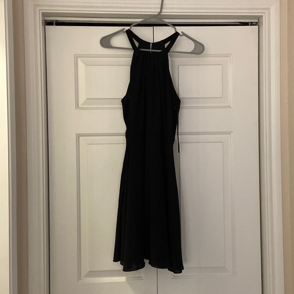 Black halter dress, semi open back